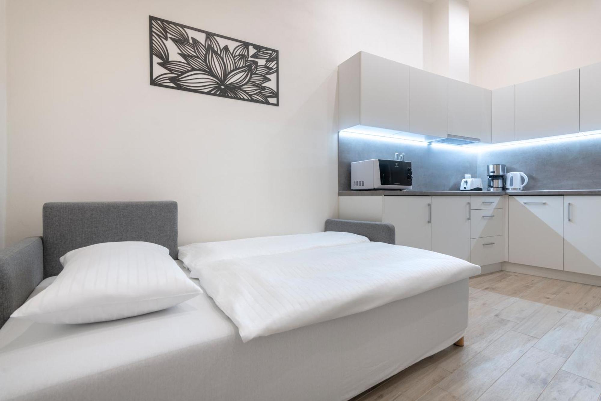 Kinsky Garden Apartments And Suites By Dwellfort Praga Cameră foto